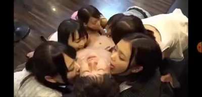 6 Japanese girls in a restaurant lick 1 guy all over