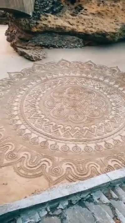 This man finally finished his sand art