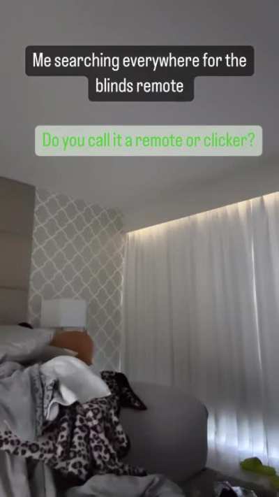 Jen Selter trying to close the blinds. 