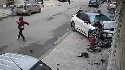 Woman hits biker accidentally