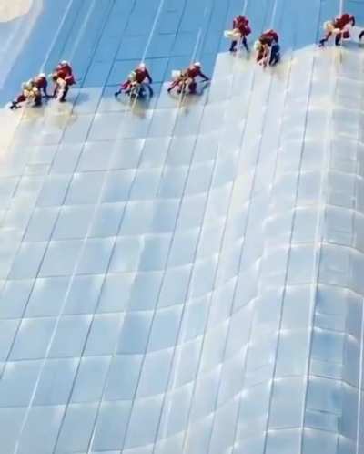 Cleaning windows on a 1000ft skyscraper