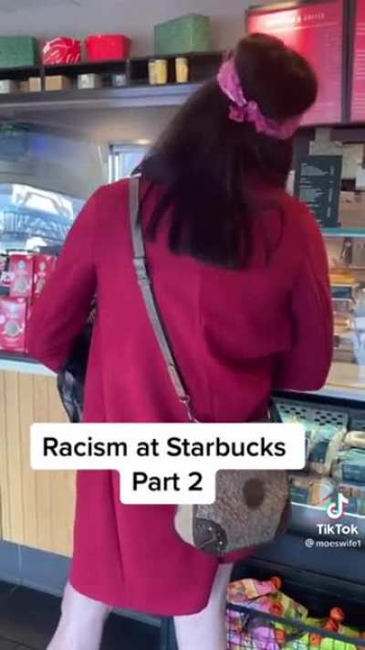 Bizarre man harasses a woman trying to get her coffee at Starbucks