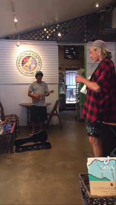This guy doesn’t realize he is playing and singing a song with Matisyahu