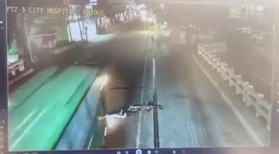 Motorcycle rider met and accident and got ran over by a bus