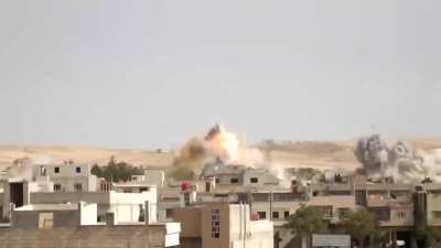 SyAAF plane drops a load of six parachute retarded bombs on the neighborhood of Yabroud, Rif Dimashq - 5/17/2013