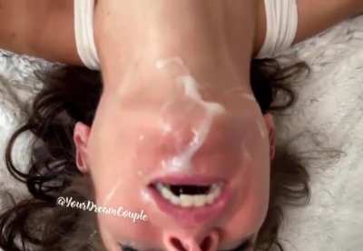 Head hanging over the bed getting the last few drops!