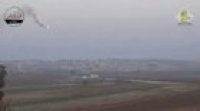 Hezbollah driver calmly waits for the just the right second to move his pickup truck to avoid guided missile, Syria.