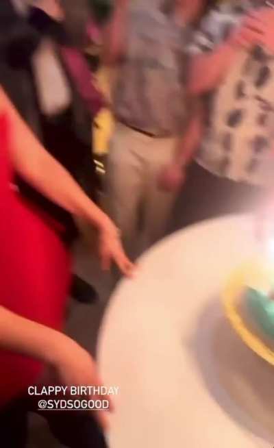 Ready to burst out of her birthday dress…