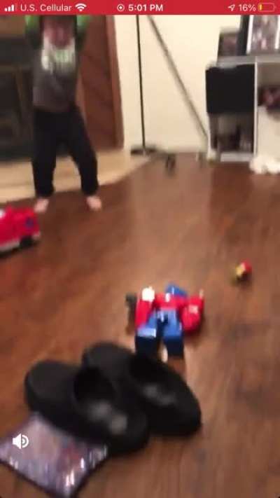 Kid smashes toy into face