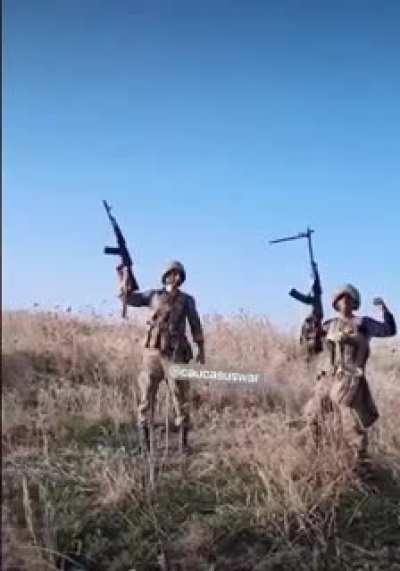 Azerbaijani soldiers filming themselves for Tiktok are interrupted by an artillery strike behind them