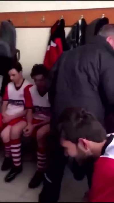 Coach motivating his team