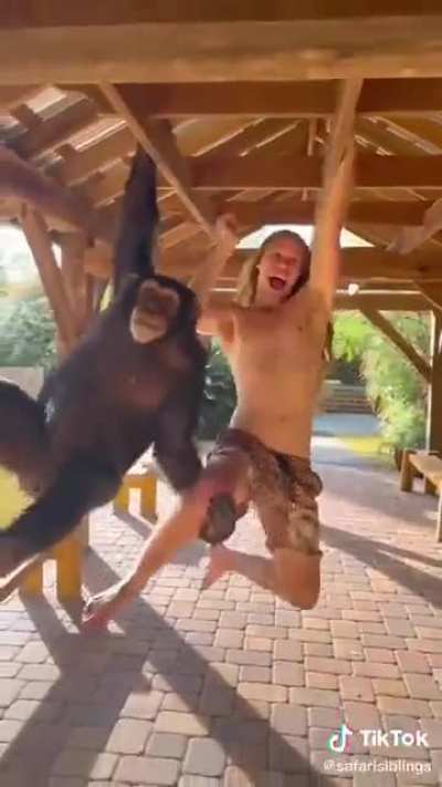 Just a guy hanging out with a monkey