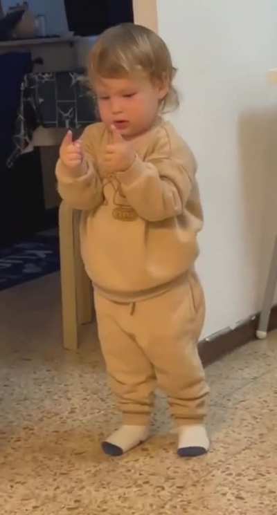 Little dude getting his thumbs up on point