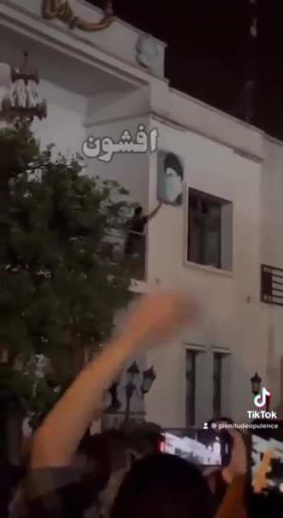 Protesters in Iran have begun tearing down portraits of religious leaders Khamenei and Khomeini from government buildings
