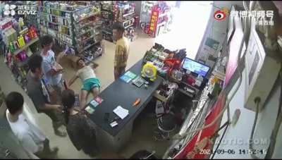 Store owner knocks out a rowdy dickhead with a baseball bat for causing a scene