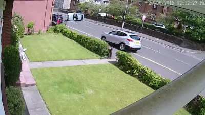 Apparently wearing a red shirt and standing in front of a car isn't enough to be visible to some...