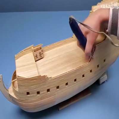 Guy builds stunning ship using wood strips