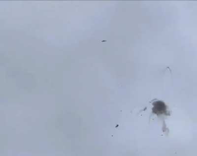 Ground footage showing two Ukrainian interceptor drones chasing one Russian 