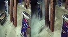 Guy tries to burn a spider while pumping gas