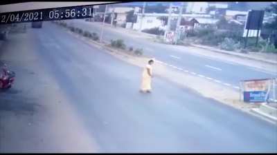 Woman moves into the path of the biker, gets hit by it
