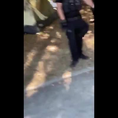 Antifa woman wishes death upon a group of cops just for standing there.