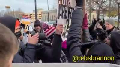 BLM and Antifa intimidate woman with sign that says 