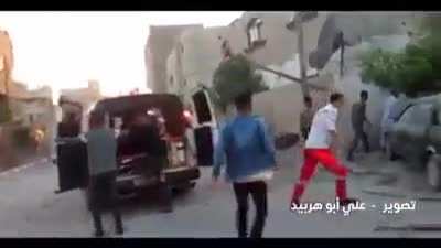 Footage of the Israeli massacre of civilians in the Bedouin village in the northern Gaza Strip Thursday afternoon.