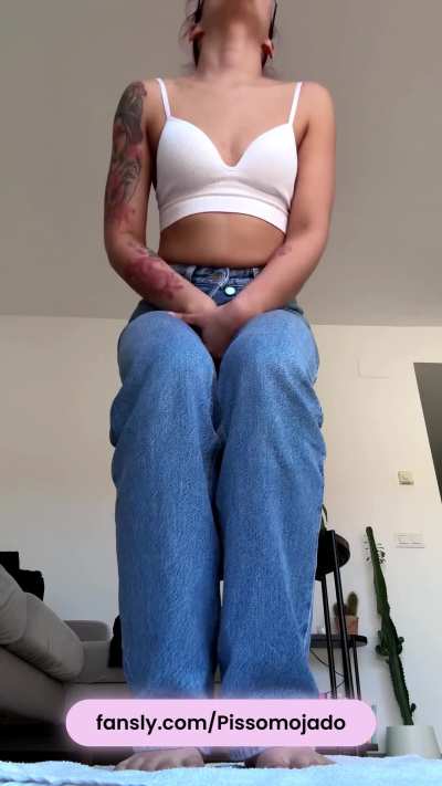 Desperately wetting my jeans and panties feeling my pee running down my legs