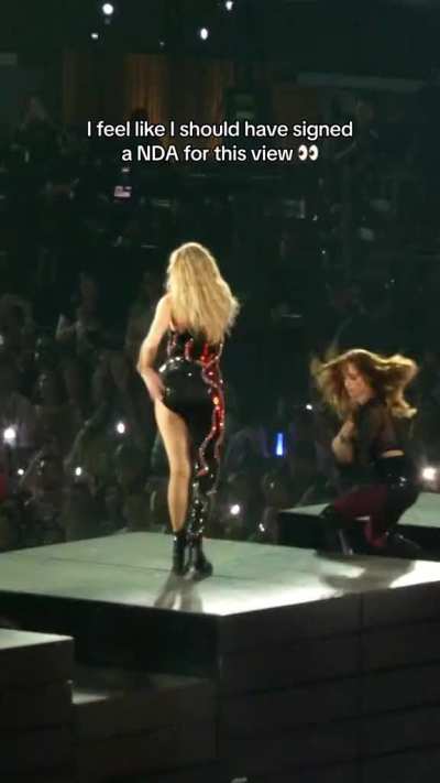 From behind