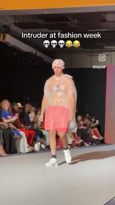 Dude wears a trash bag on a runway, audience doesn't even notice