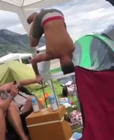 Standing on your head on a plastic table