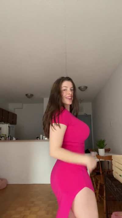That dress hugs her well