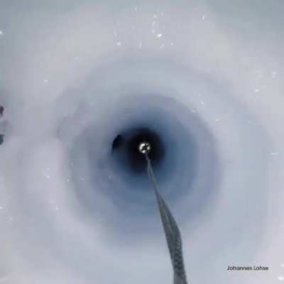 Camera dropped down a 650m-deep (2100 ft) hole to study how global warming will affect Antarctica