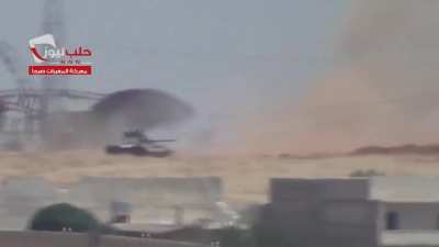 Syrian Army T-55 takes a direct anti-tank strike & beats a hasty retreat - al-Rashideen, Aleppo - 7/7/2013