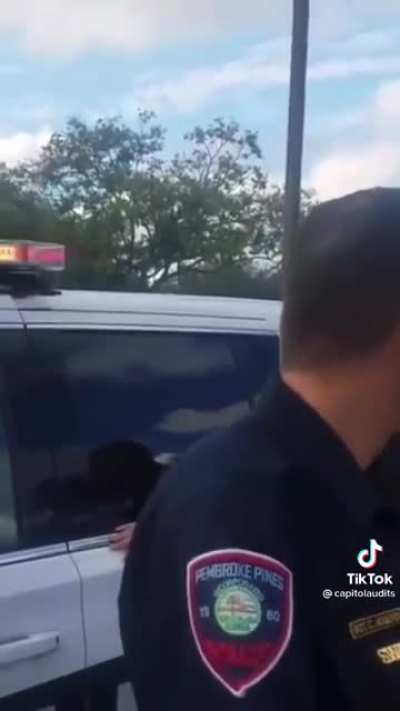 Cop wants a man’s ID because he is recording outside of a police station.