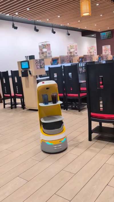 Robots replacing human waiters.