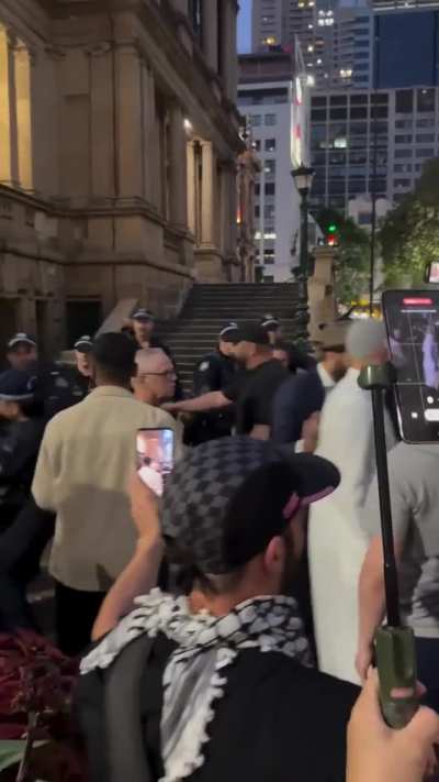 People praying were moved away by police in Sydney
