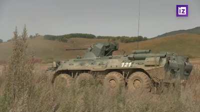 RU POV: Mobilized Russian soldiers training with tanks and APCs.