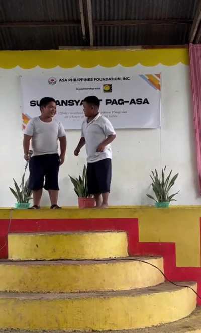 Two boys make the room laugh