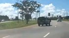 Biker tries to escape the police