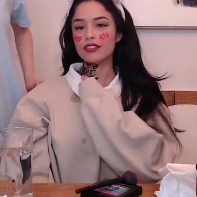 Rae gets a neck tattoo