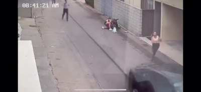 Guy runs over a Mother and baby, tries to drive away before being stopped by a truck (Venice, CA)
