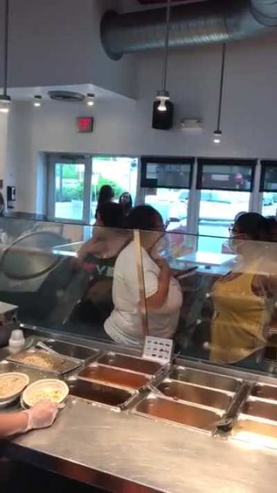 Lady throws drink at Chipotle workers