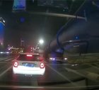 Truck crushes a car when making a turn