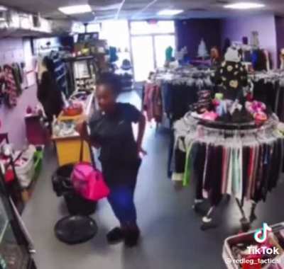 Woman tries to shit in a trash can in a store.....