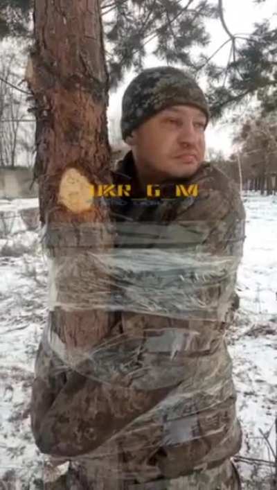 ru pov. Ukrainian soldier got tied to a tree as punishment by his fellow soldiers because he got drunk