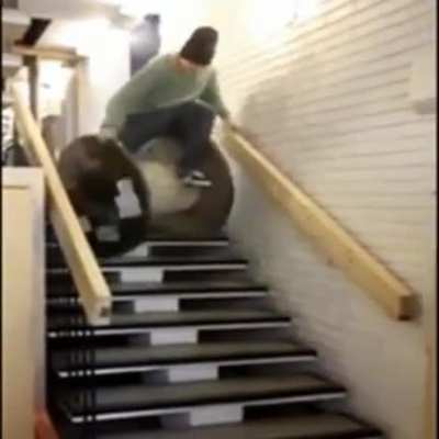 Rolling down the stairs on a big wooden thing. WCGW?