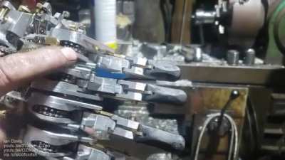 Steampunk prosthetic hand with mechanical grip patterns