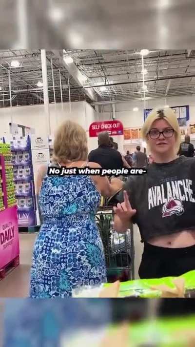 Lady Keeps Bumping Her Cart Against Guy