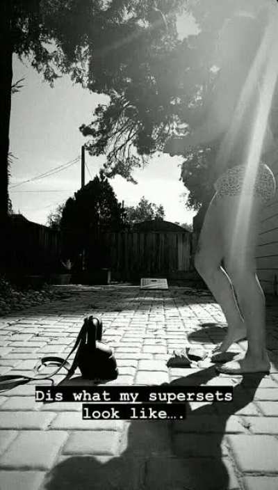 Bayley playing cornhole